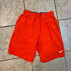 Men’s orange Nike shorts Small